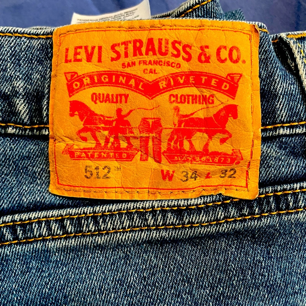 2 pairs of Levi’s jeans .